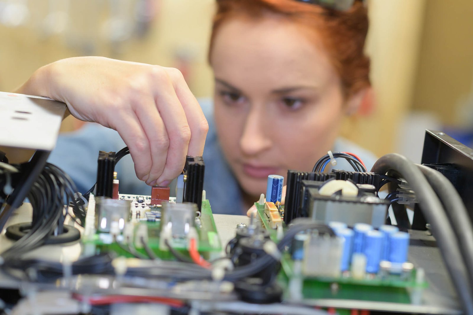 woman working on electrical system PD4WMAJ